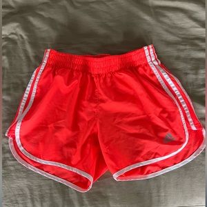 Women’s XS Adidas Shorts.  Neon Orange.  White stripes